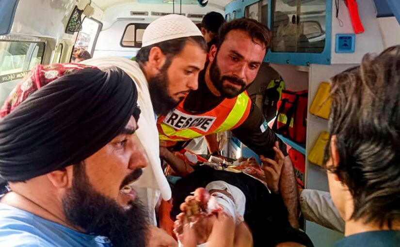 Bomb at political rally in northwest Pakistan kills at least 35 people and wounds more than 100