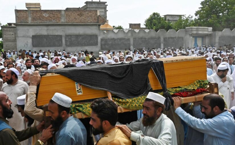 Pakistan holds funerals as government vows to hunt down those behind deadly suicide bombing