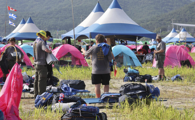 Tens of thousands of young scouts to leave South Korean world jamboree as storm Khanun looms